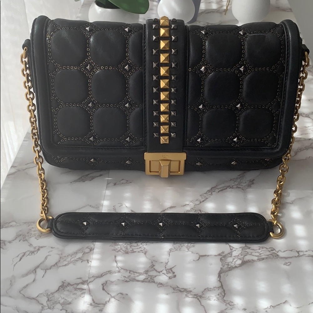 MCM black/gold purse